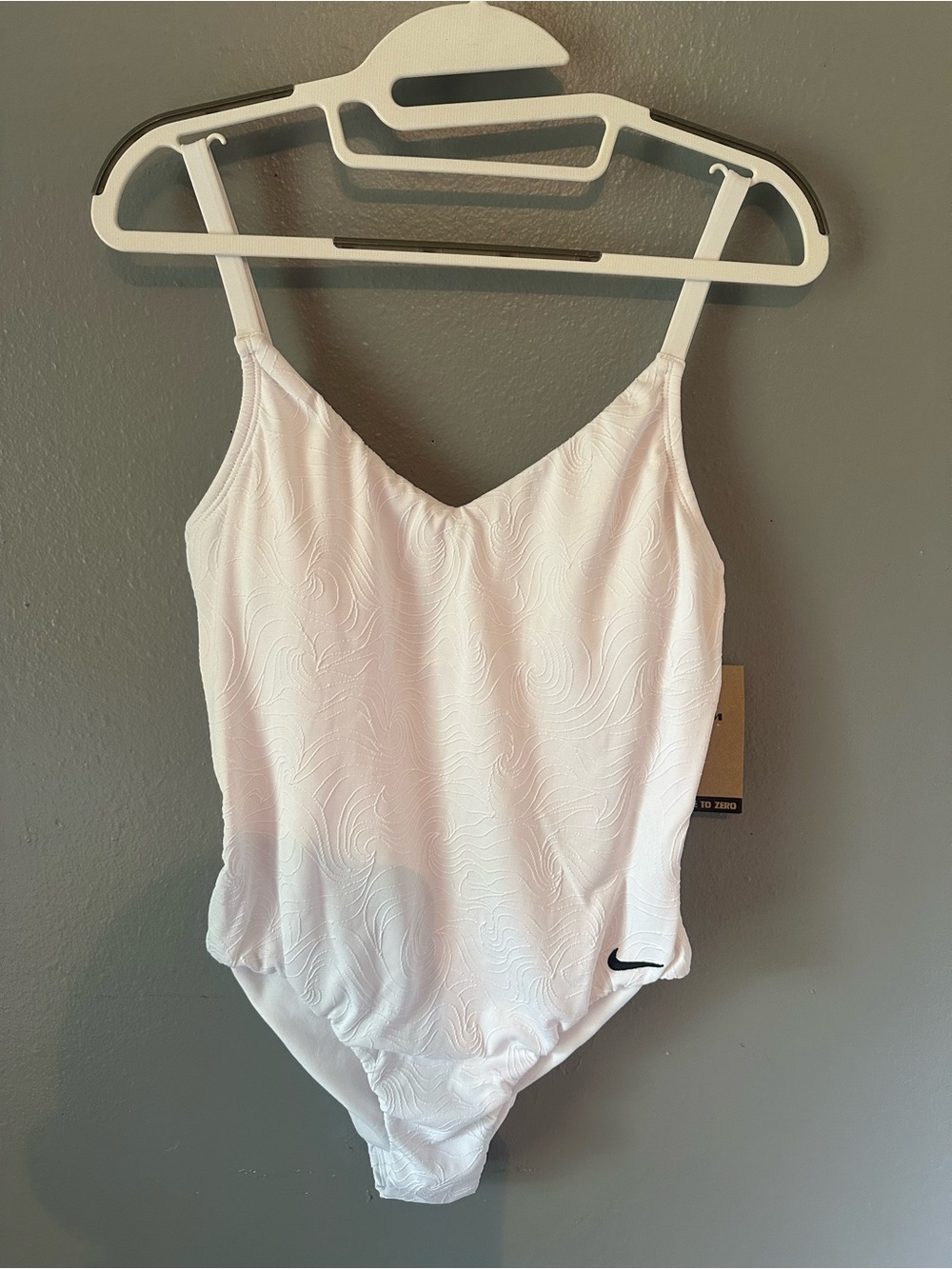 Nike White Textured V-Neck One-Piece Bodysuit